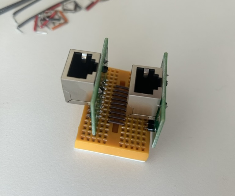 The passthrough section. All eight pins wired straight between J1 and J2.